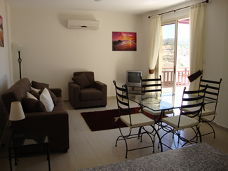 The lounge/dining area with sliding doors onto the patio